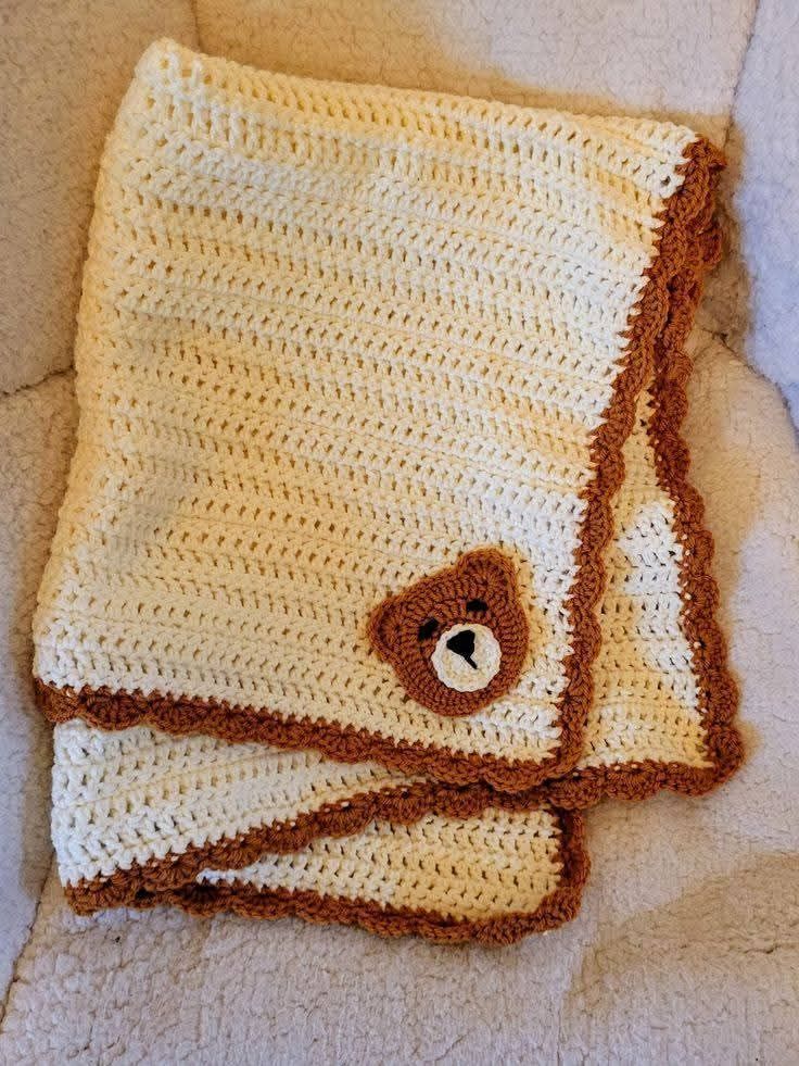 Easy crochet baby blanket with yarn and crochet hook