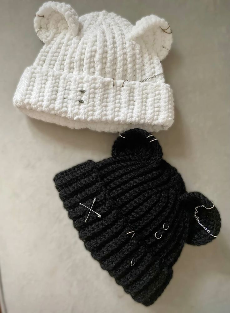 Crochet baby hats in cream, beige and pink yarn