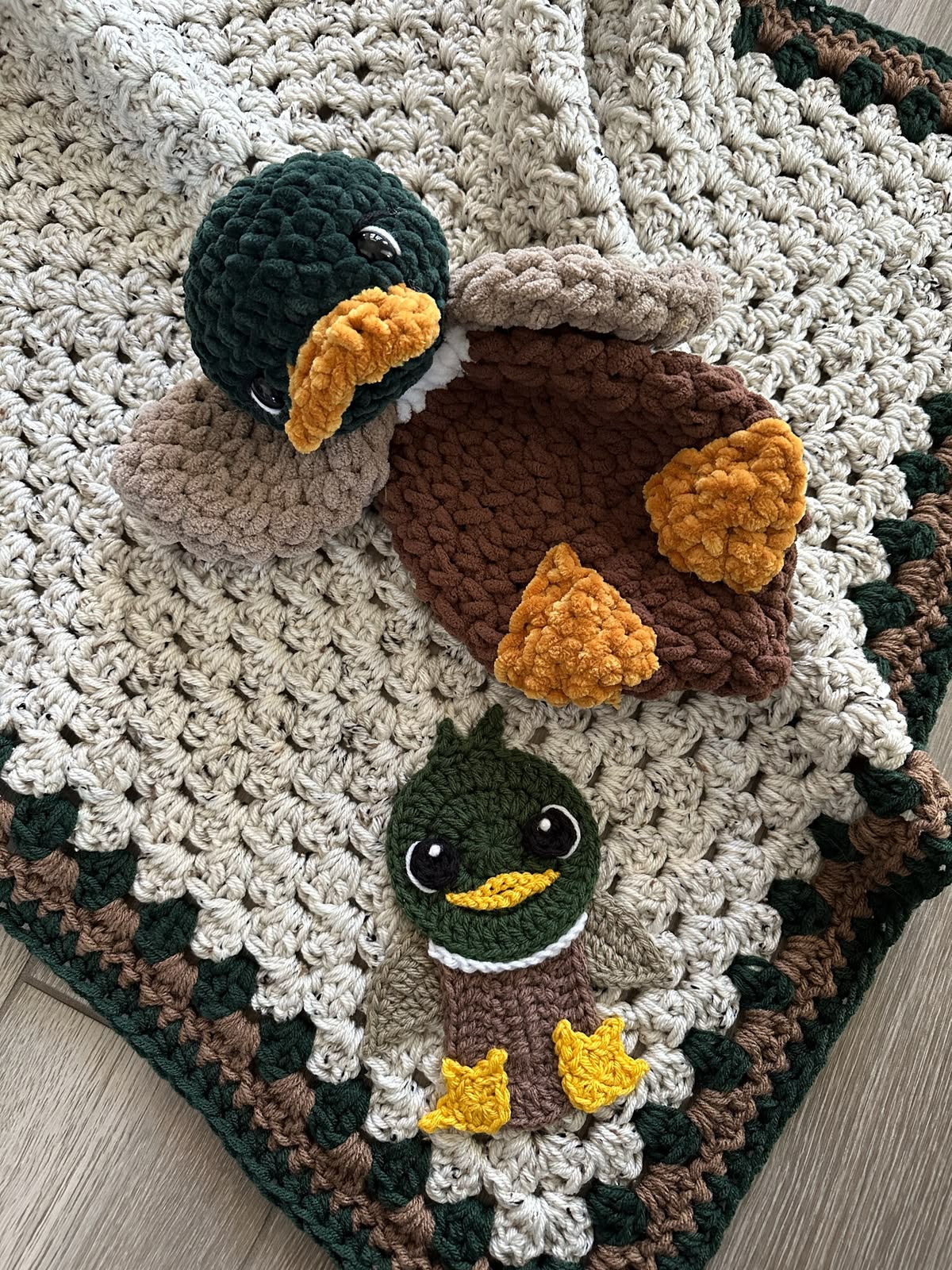 Crochet duck-themed baby blanket