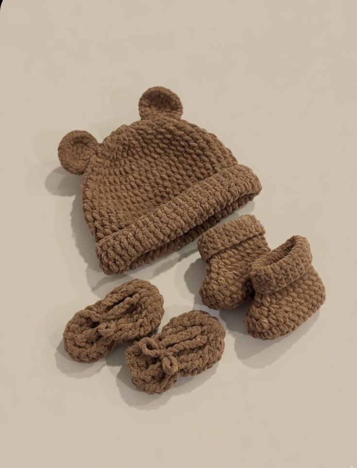 Brown crochet bear-ear baby hat and matching booties made from the tutorial
