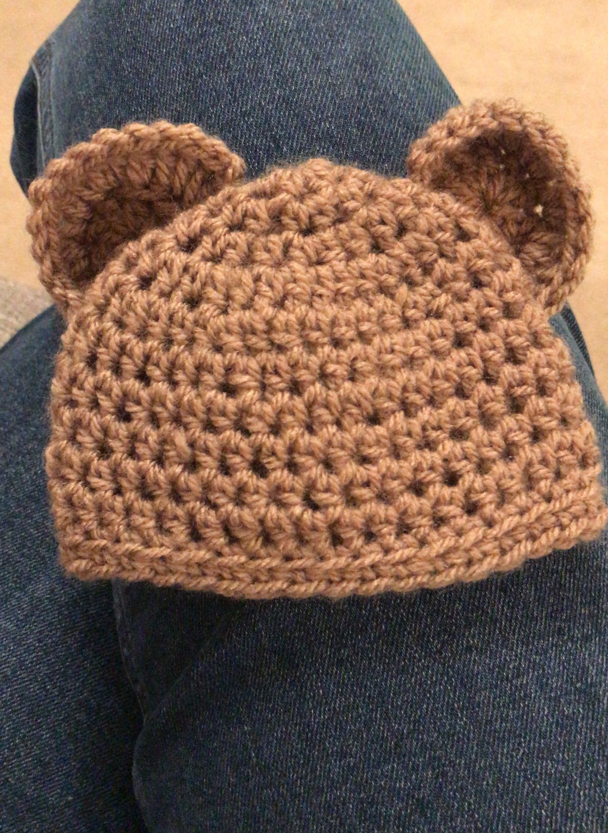 Brown crochet bear-ear baby hat made from the tutorial