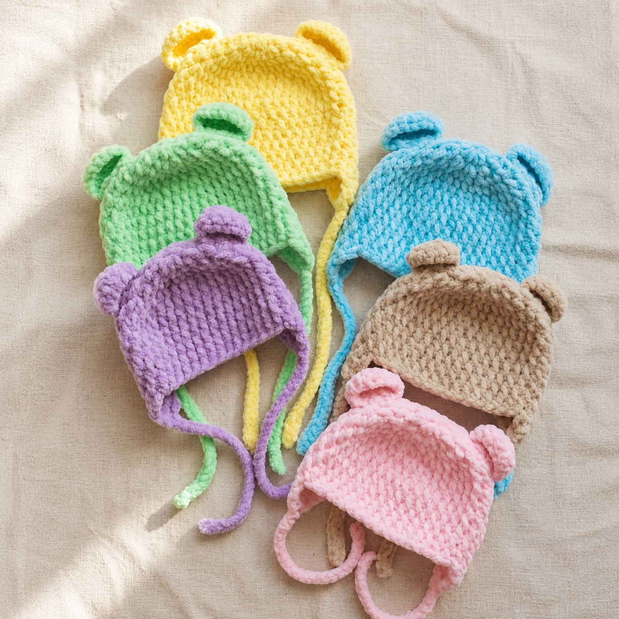 Member-made crocheted baby booties or hat